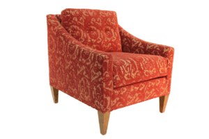 Sage accent chair with red detailed cushions and short wooden legs available at Cottswood Interiors